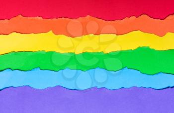 Rainbow flag made of paper, LGBT symbol. horizontal multicolored stripes