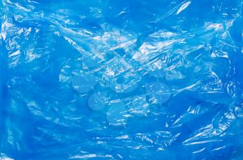 Blue plastic bag. The concept of using environmentally friendly packaging, processing and sorting, preservation of the environment