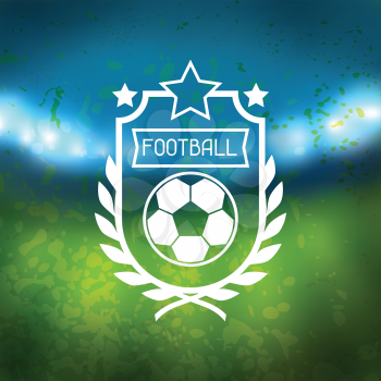 Sports label with football symbols on blurred stadium background.