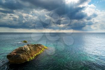 Heavy clouds on sea. Nature composition.