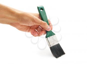 Hand with green brush. Element of design.