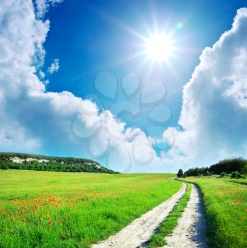 Lane in meadow and deep blue sky. Nature design. 