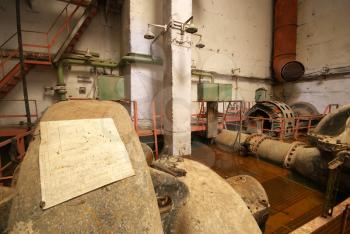 Old rusted pump station. Inside of industrial object.