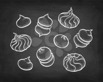 Meringue cookies. Chalk sketch on blackboard background. Hand drawn vector illustration. Retro style.