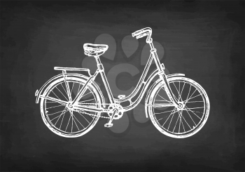 Vintage bicycle. Chalk sketch on blackboard background. Hand drawn vector illustration. Retro style.