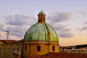 dome of Cathedral  under golden rays of setting sun Ancona Italy