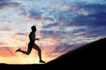 Running sports. Runner athlete and the hill on his way