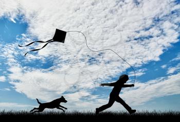Silhouette of child playing with dog on the nature and kite. Concept friendship