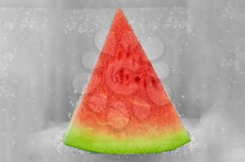 Piece of watermelon frozen in the ice. design element
