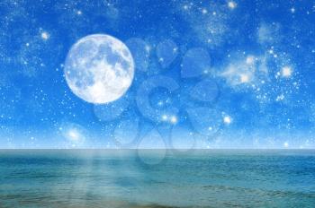 Beautiful night landscape night sea and starry sky with the moon