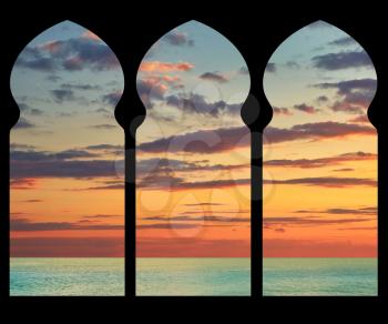 Silhouette arches inside the building of the mosque in the background of the sea sunset