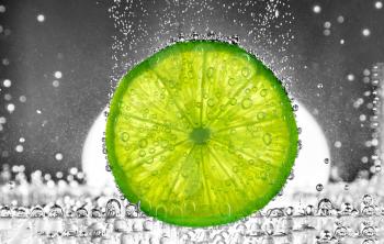 Cut lime in the water. design element