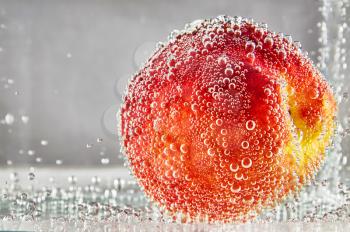 Ripe peaches in water. design element