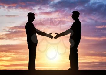 Silhouette two men intend to shake hands. Business concept of business relations