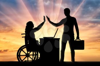 Worker woman a disabled person in a wheelchair and the employer. The concept of employment of persons with disabilities
