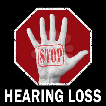 Stop hearing loss conceptual illustration. Open hand with the text stop hearing loss. Global social problem