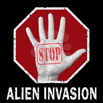 Stop alien invasion conceptual illustration. Open hand with the text stop alien invasion.