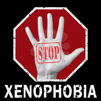 Stop xenophobia conceptual illustration. Open hand with the text stop xenophobia. Global social problem