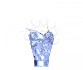 Glass of water, ice and slice of fresh lemon on a white background