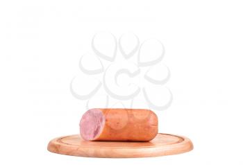 Large piece of ham with cut slices on wooden platter, isolated on white background