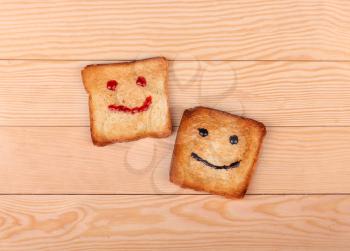 Two slices of bread with smiles