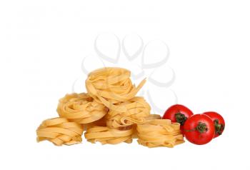 row dry nest pasta on white and cherry
