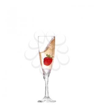 Single Strawberry splashing into a glass of champagne