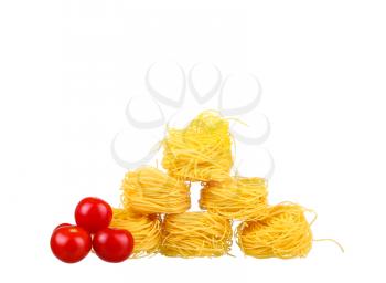 row dry nest pasta on white and cherry