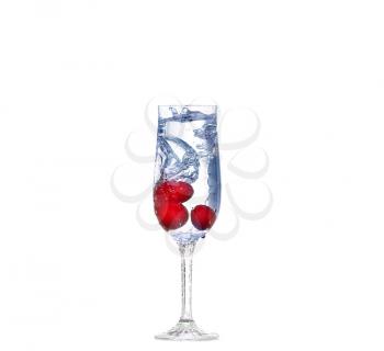 cherry splash in a cocktail glass on white