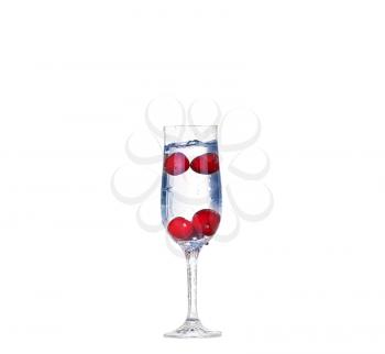 cherry splash in a cocktail glass on white