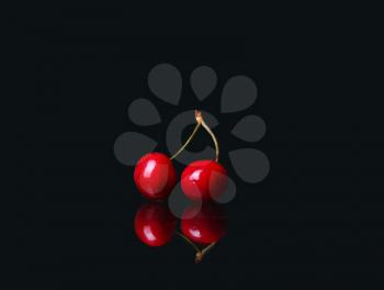 two cherries on black background