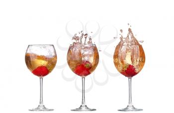 Collage Single Strawberry splashing into a glass of wine