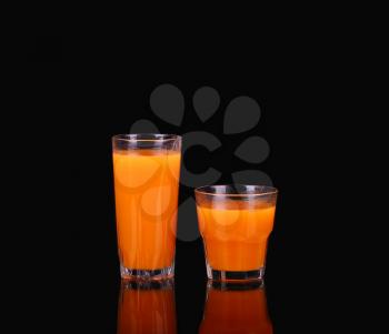 Carrots and juice in a glass