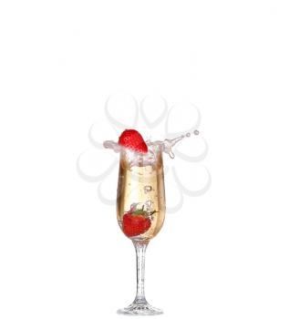 Single Strawberry splashing into a glass of champagne