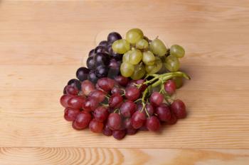 Grapes on a wooden table