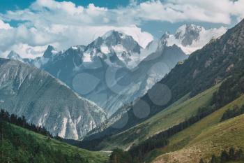 Mountain river Baksan, ravine Adyr-Su, Elbrus area, Greater Caucasus Range. Elbrus, mountains in summer. Greater Caucasus Mountains from Mount Elbrus