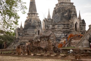 AYUTTHAYA THAILAND APRIL 7, 2017 a group of Buddhist child monks with their elder in the temple of Wat Phra Sri Sanphet, Historic City of Ayutthaya