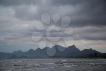 Rocks on the horizon, the coast of Thailand. Before the storm