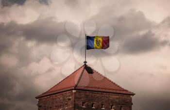 Flag with original proportions. Closeup of grunge flag of Moldova