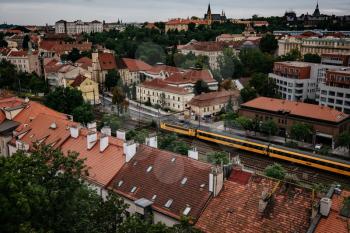 PRAGUE,CZECH REPUBLIC - 11 AUGUST 2019: View on the Old Town or Stare Mesto Prague from above. Prague postcard, tourist attraction. View of Prague roofs and Prague castle from Vysehrad castle,