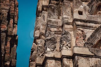 Sukhothai Historical Park, a UNESCO World Heritage Site in Thailand. Stucco work on the prangs of Wat Sri Sawai.