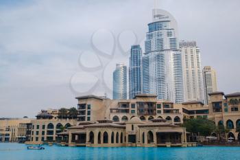 DUBAI, UNITED ARAB EMIRATES - FEBRUARY 10, 2021: Downtown Dubai landmarks and tourist attractions - The Dubai Mall and the Fountain - The address - Burj Khalifa, Luxury travel in the Middle East