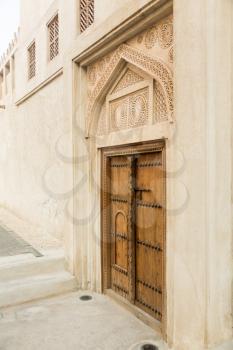 Detail of wooden door at Shaikh Isa bin Ali House in Al Muharraq, Bahrain, Middle East