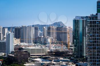 View over Waikiki showing new condos under construction as the city of Honolulu expands on Oahu, Hawaii