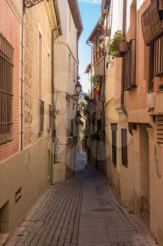 Narrow streets and homes in ancient city of Toledo, Spain, Europe