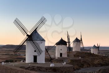 Preserved historic windmills on hilltop above Consuegra in Castilla-La Mancha, Spain