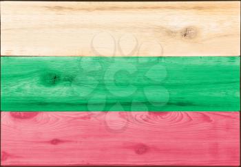 Timber planks of wood that have been painted or stained in the colors of a Bulgarian flag as a background