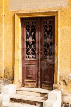 Wooden doors leading into crypt in the Greek Orthodox cemetery in Convent of St George in Coptic or Old Cairo in Egypt