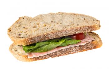 Isolated image of an english ham lettuce and tomato sandwich. Bread is artisan multigrain wheat.