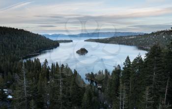 Sunset at Emerald Bay on Lake Tahoe between California and Nevada with snow covered Sierra Nevada Mountains